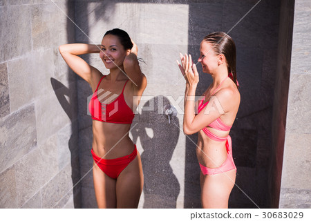 Shower On Beach. Two Beautiful Fit Woman Taking 30683029