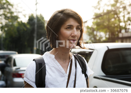 Woman traveler on street wnaderlust Woman traveler on street wnaderlust 30687076
