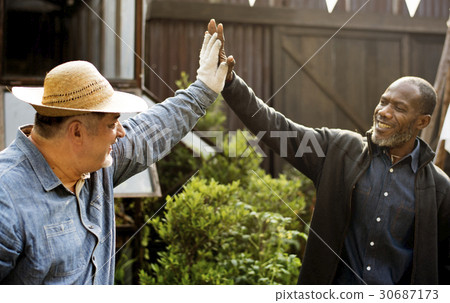 Group of people high five for support and achievement Group of people high five for support and achievement 30687173