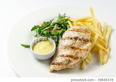 grilled chicken with french fries 30688159