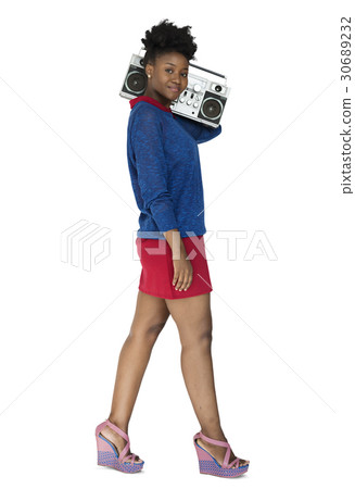 African Descent Woman Holding Jukebox African Descent Woman Holding Jukebox 30689232