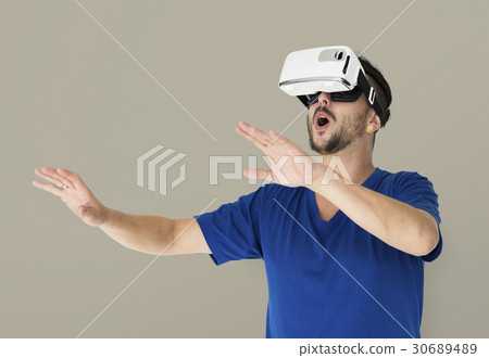 A man using a visualiaing reality gadget 30689489