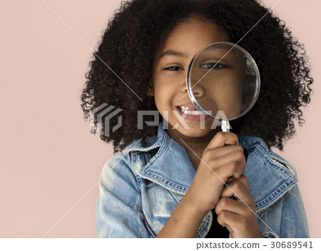 Little Girl Holding Magnifying Glass Smiling Little Girl Holding Magnifying Glass Smiling 30689541