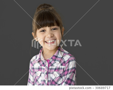 A little girl with a cheerful smile A little girl with a cheerful smile 30689717