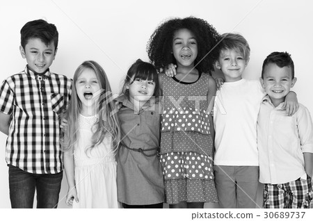 Diverse group of kids standing in a row portrait 30689737