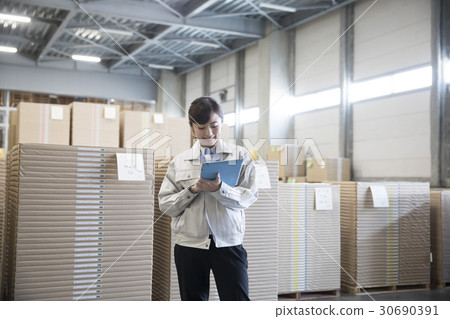 Logistics warehouse business woman Logistics warehouse business woman 30690391