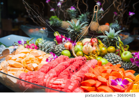 Sliced various fresh fruits Sliced various fresh fruits 30690485