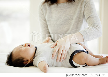 An infant An infant 30693196
