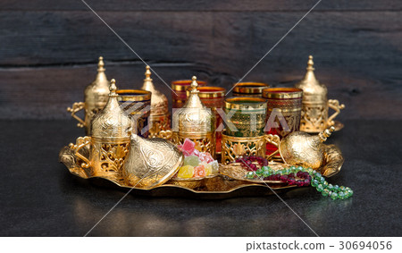 Arabic tea coffee table golden cups Ramadan kareem 30694056