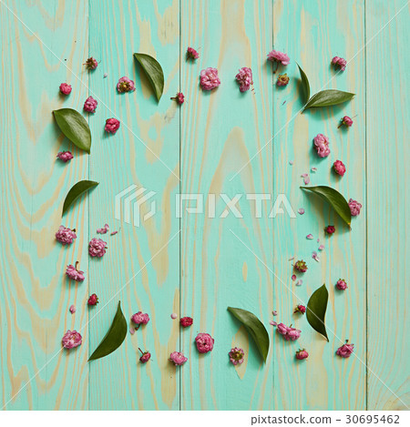 Frame of flowers and leaves 30695462
