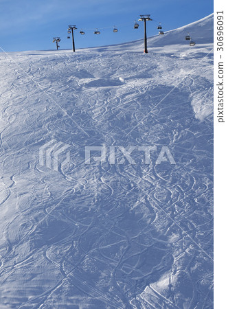 Off-piste slope at sun morning 30696091