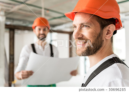 Hilarious smiling constructor in unready room Hilarious smiling constructor in unready room 30696285
