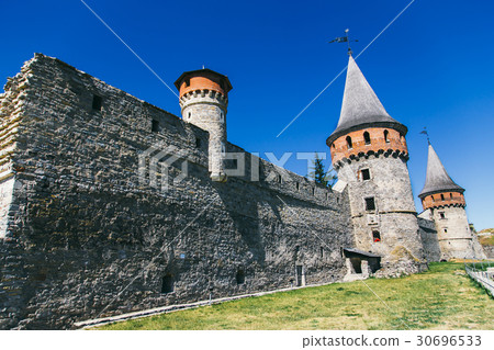 Wall with a fortress tower in Kamenets-Podolsk Wall with a fortress tower in Kamenets-Podolsk 30696533