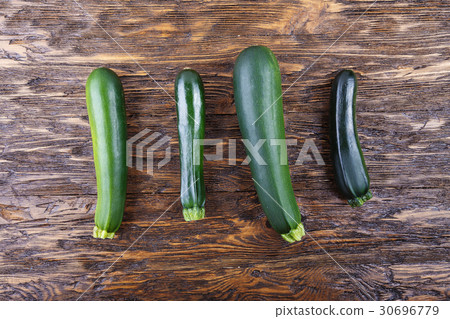 zucchini on a wooden background 30696779