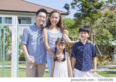 a photo of a happy family. a photo of a happy family. 30698096