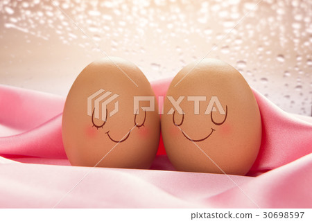 Two eggs with love for each other 30698597