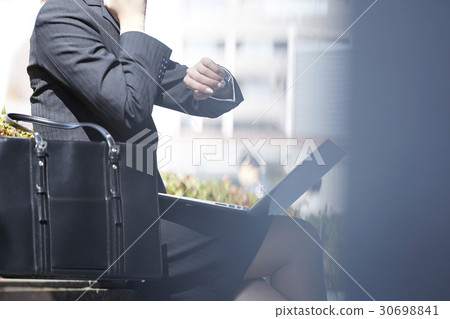 Business woman outdoors 30698841