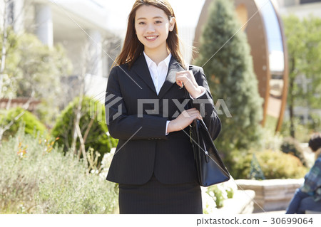 Business woman outdoors 30699064