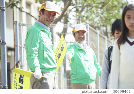Safety assistance at senior volunteer school road 30699401