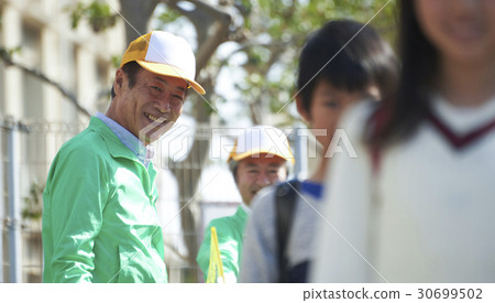 Safety assistance at senior volunteer school road 30699502