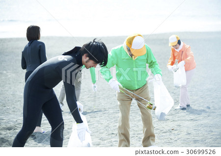 Senior volunteers and surfers to clean the beach 30699526