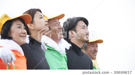 Senior volunteers and surfers to clean the beach 30699657