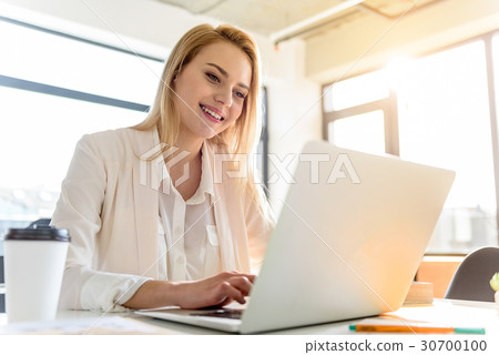 Confident girl looking for creative solutions 30700100