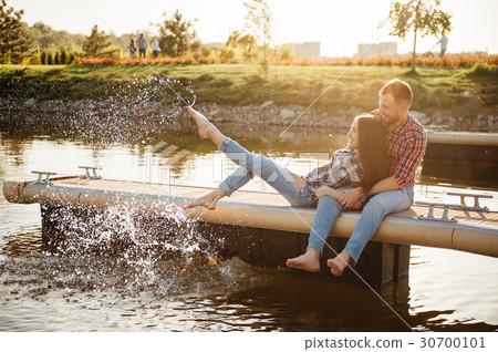 Happy couple walking in the park 30700101