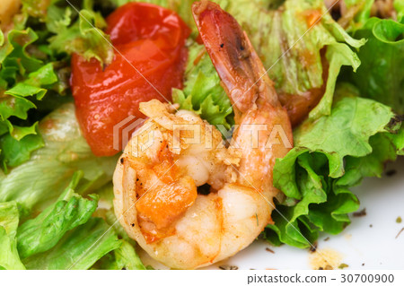 Delicious warm seafood salad. 30700900