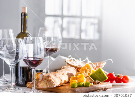 Wine, baguette and cheese on wooden background 30701087