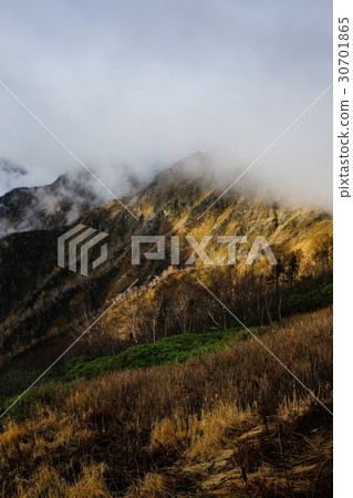 Mountain climbing · Gathering clouds 30701865