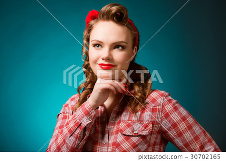Pretty pinup girl in retro vintage 50's style Pretty pinup girl in retro vintage 50's style 30702165