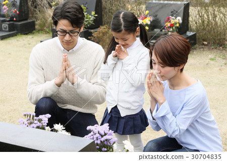 a visit to a grave  30704835