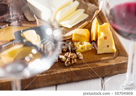 Wine, baguette and cheese on wooden background 30704909