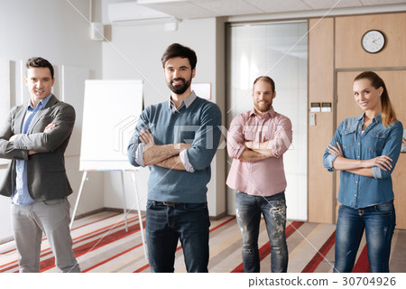 Competent workers standing in two lines Competent workers standing in two lines 30704926