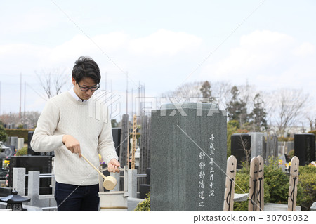 a visit to a grave  30705032