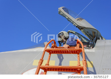 Military pilot in the cockpit of a jet aircraft Military pilot in the cockpit of a jet aircraft 30705127