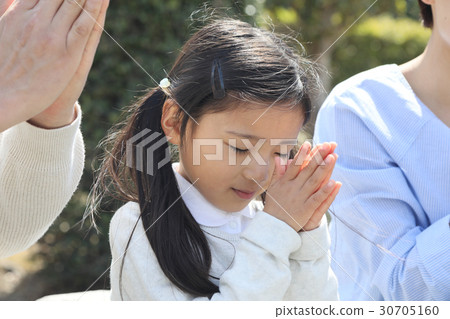 a visit to a grave  30705160