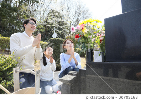 a visit to a grave  30705168