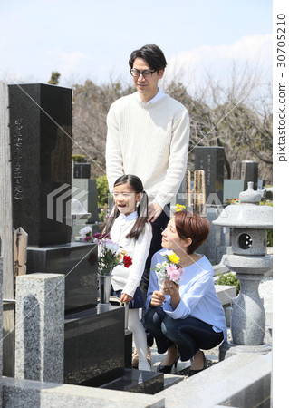 a visit to a grave  30705210