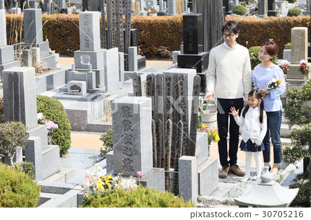 a visit to a grave  30705216