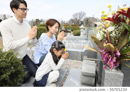 a visit to a grave  30705230