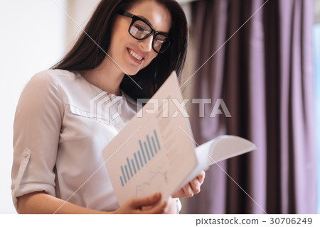 Pleasant smart businesswoman working with Pleasant smart businesswoman working with 30706249