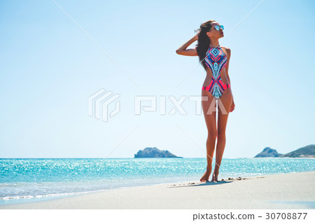 Beautiful happy slender woman at sea Beautiful happy slender woman at sea 30708877