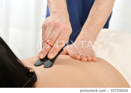 Gua sha acupuncture 30709809