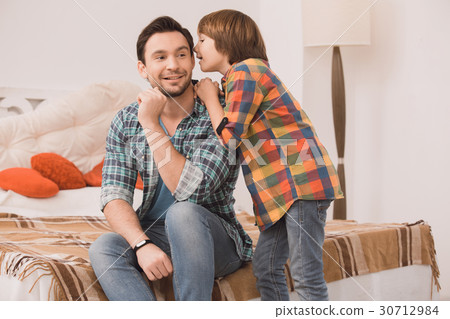 Father and son family time together at home 30712984