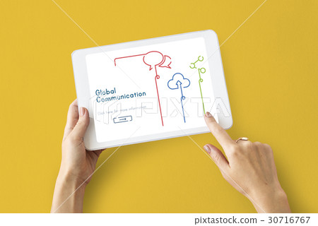 Hands working on digital device network graphic overlay 30716767