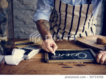 People Hand Writing Open on Chalk Board 30719396