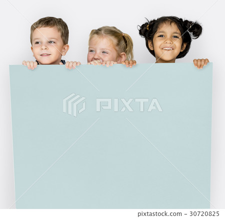 Little Children Holding Empty Paper Smiling Little Children Holding Empty Paper Smiling 30720825