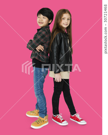 Boy and girl are posing on a shoot Boy and girl are posing on a shoot 30721468